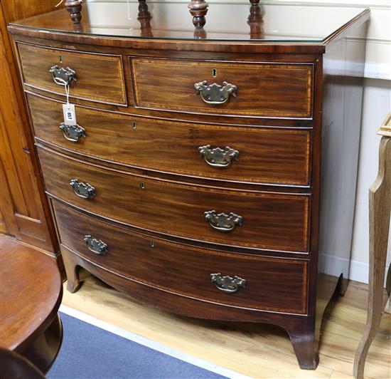 A Georgian tulipwood-banded mahogany bow-fronted five-drawer chest W.104cm